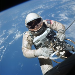 Astronaut Ed White makes the first American space walk, 1965.